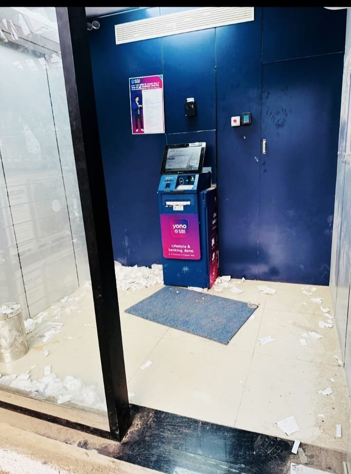 Amla: Piles of garbage in State Bank of India ATM.